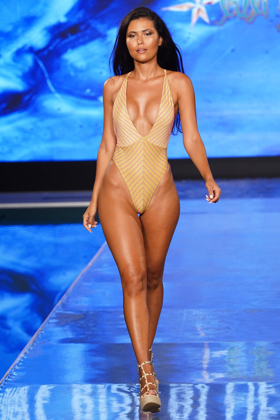 REBEL GLAM - Deep V Crossed Back One Piece • Disco Gold Runway