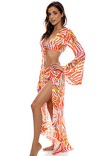 LOVE ME WILD - Bell Sleeve Crop Top & Ruffle High Lo Slit Skirt • Multicolor